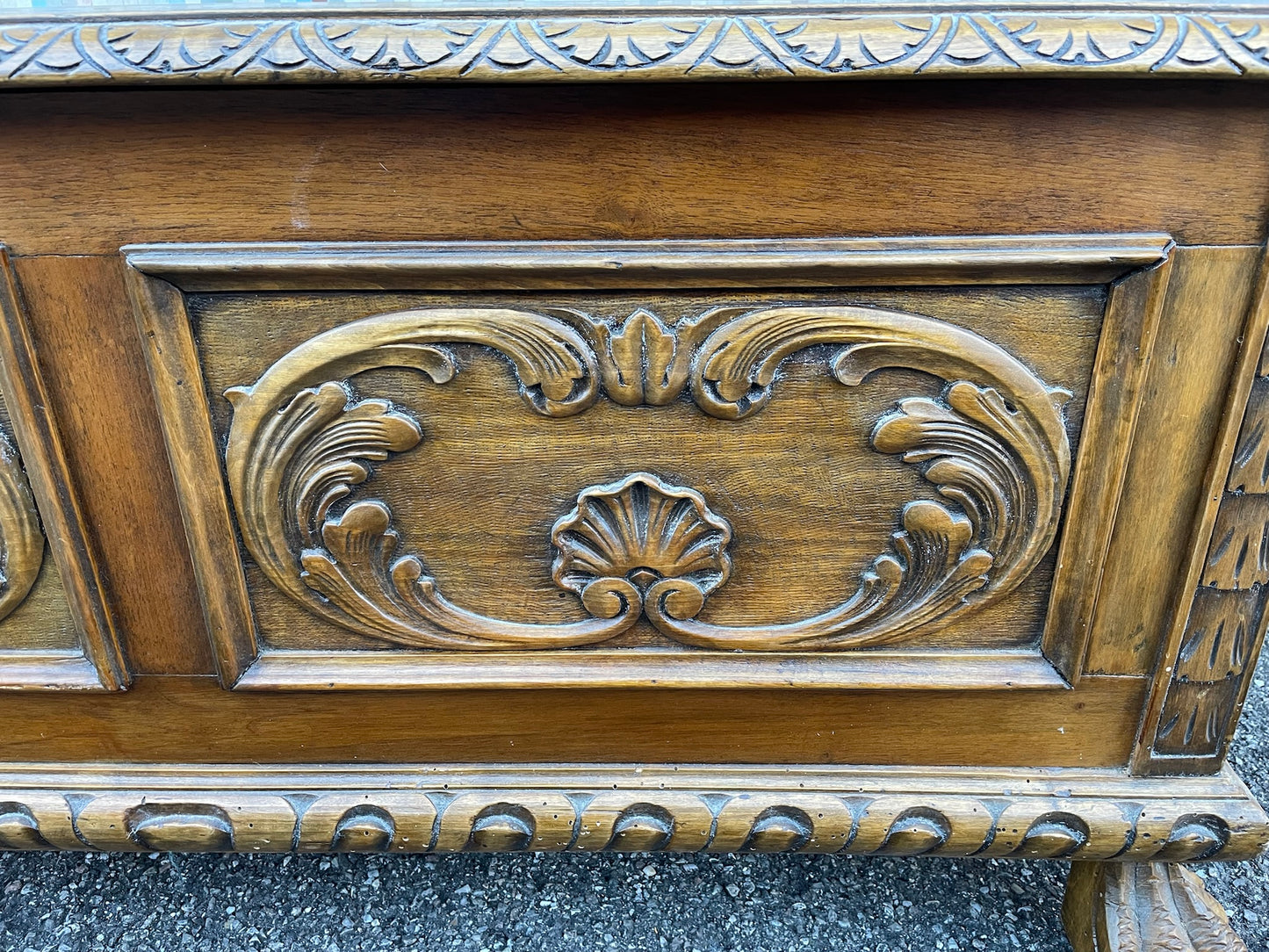 Wooden chest with lion's feet