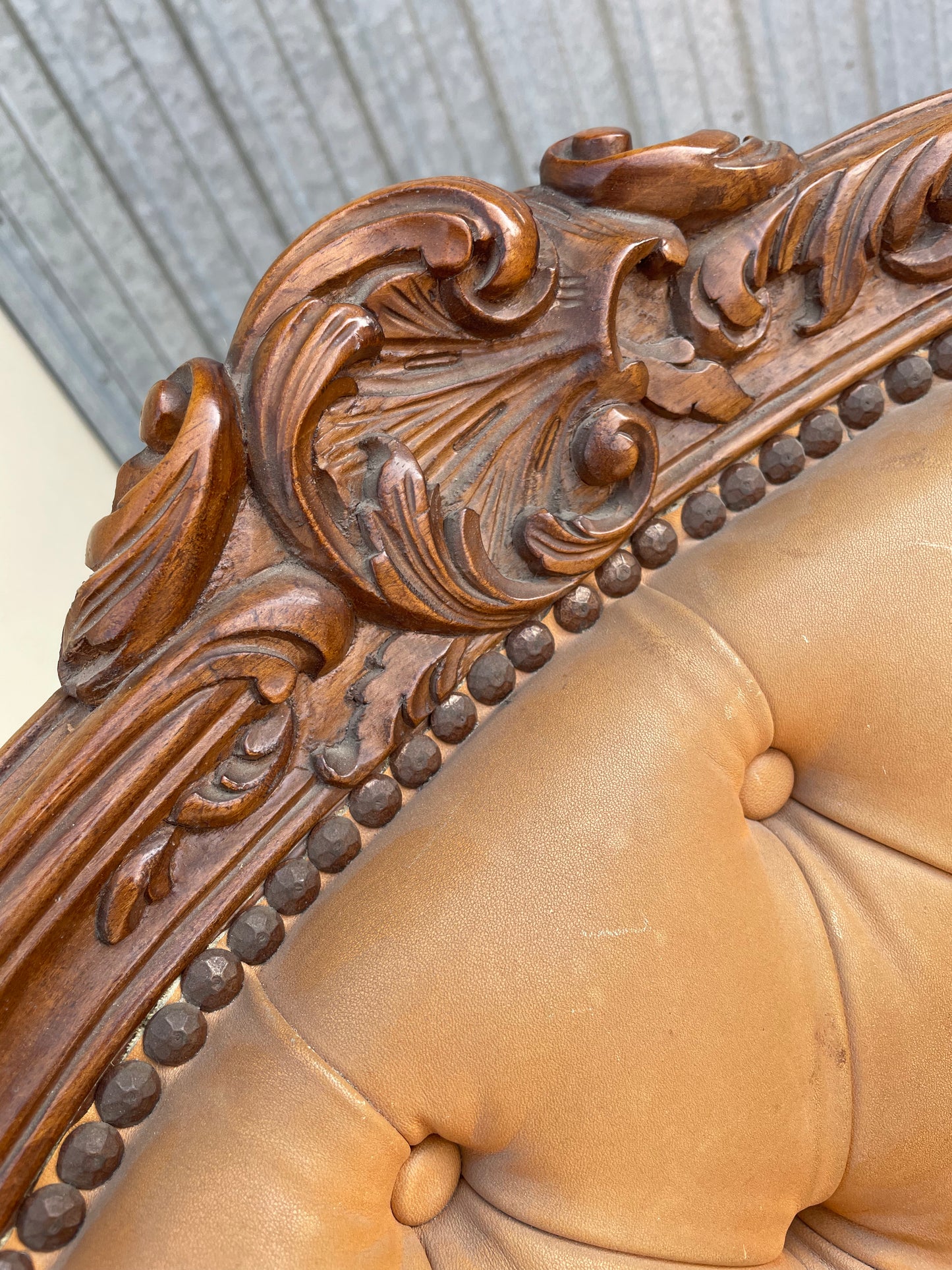 Chesterfield armchairs in wood and leather