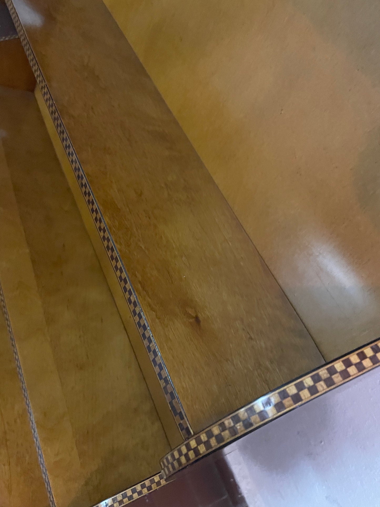 Wall bookcase with checkered profiles