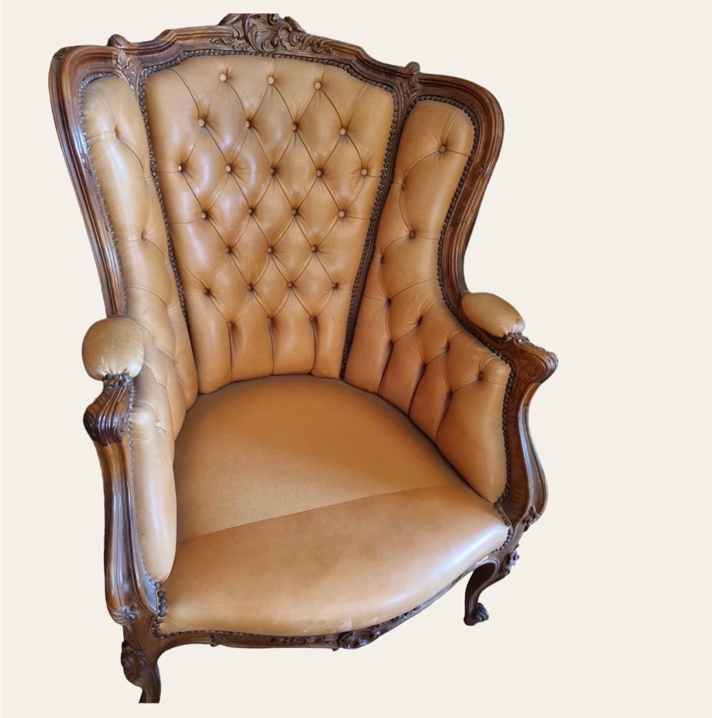 Chesterfield armchairs in wood and leather